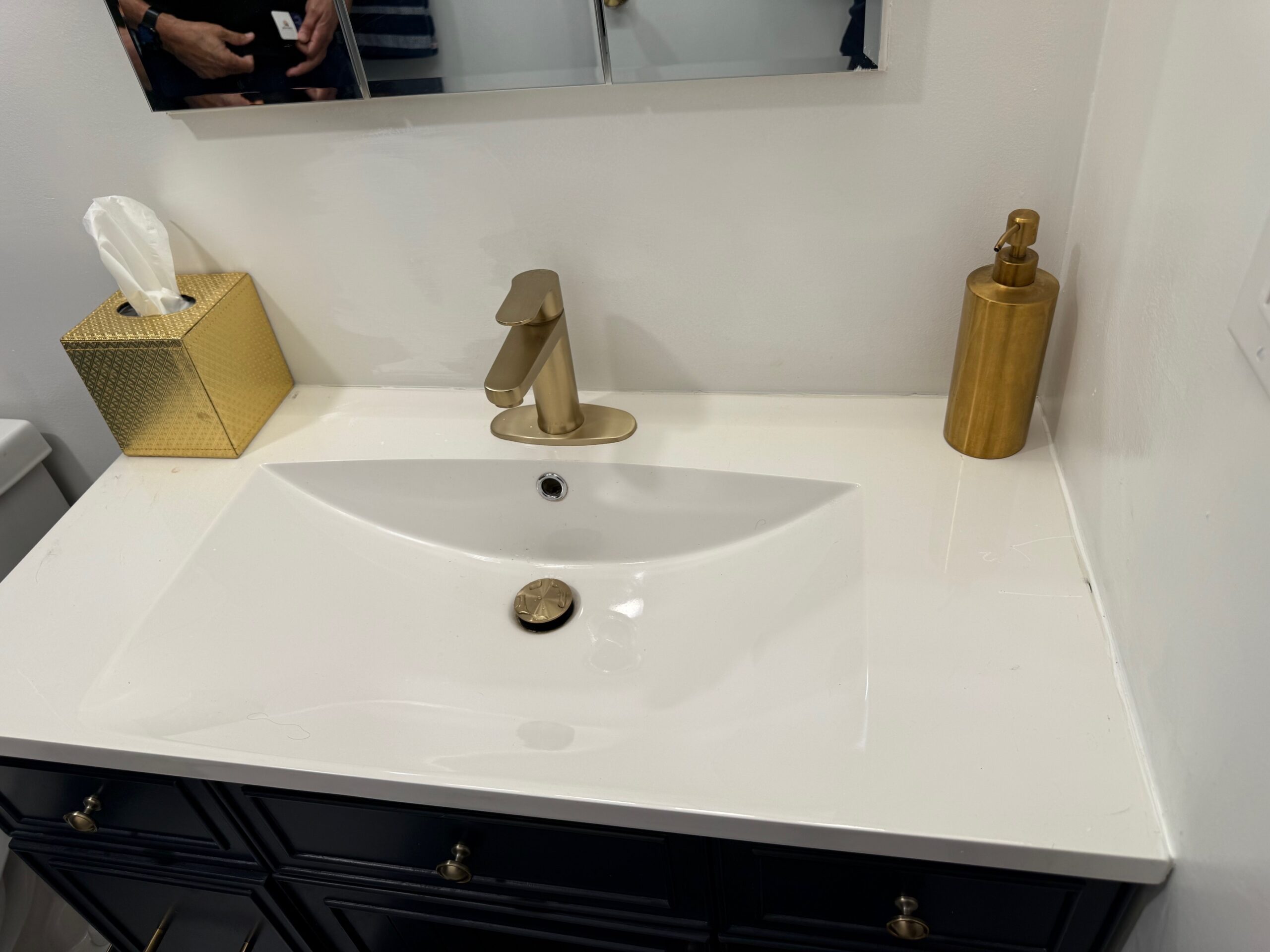 Bathroom vanity, countertop, and brushed gold faucet replaced in the Villa Park, IL Brandywine subdivision for a clean, modern bathroom update.